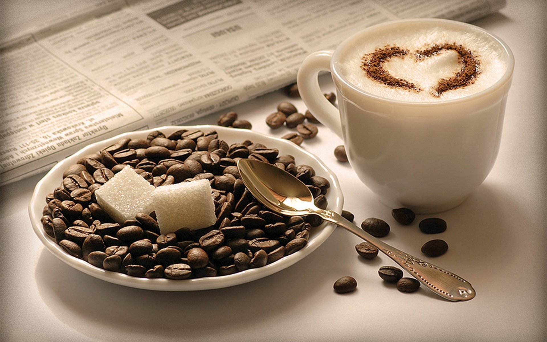 Cappuccino, Latte art a cuore, Chicchi di caffè, Zollette di zucchero, Giornale, sfondo desktop