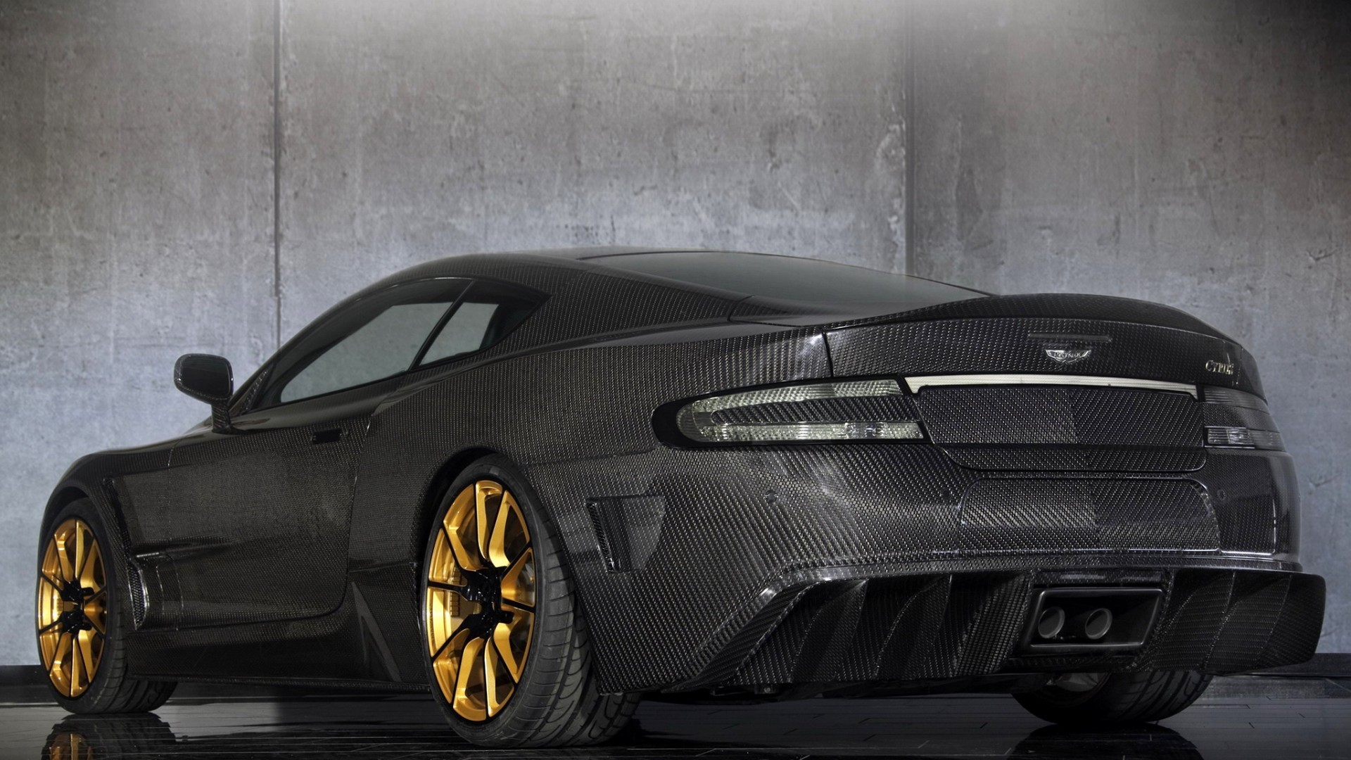 Aston Martin DBS, Mansory, Fibra di carbonio, Cerchi dorati, Vista posteriore, sfondo per PC