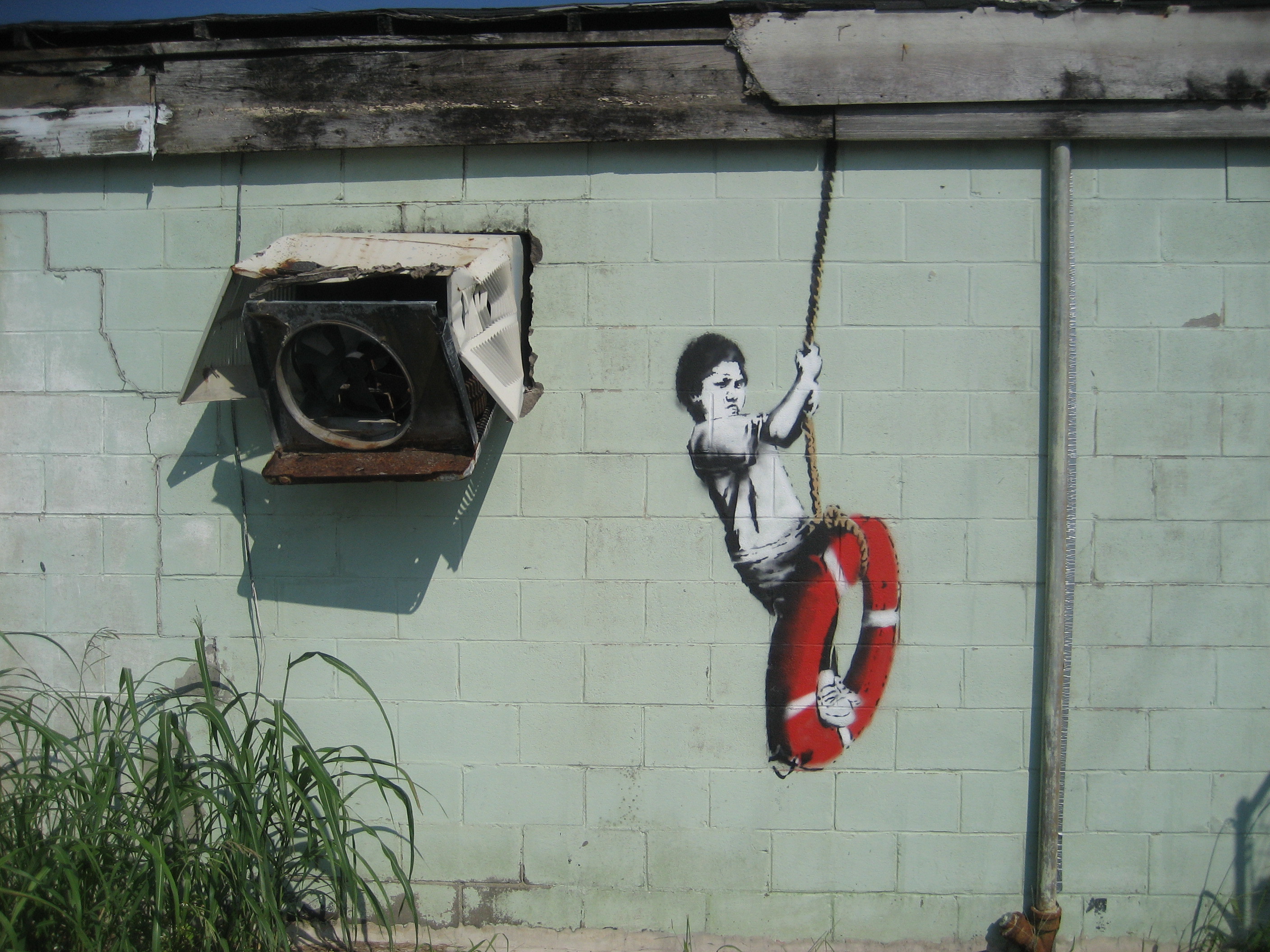 Banksy, Bambino su salvagente, New Orleans, Stencil, Arte urbana, sfondo iPad 2K