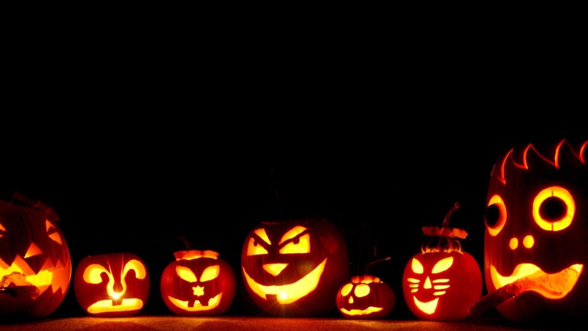 Jack-o'-lantern, Zucche intagliate, Sfondo nero, Luce di candela, Halloween, wallpaper Full HD