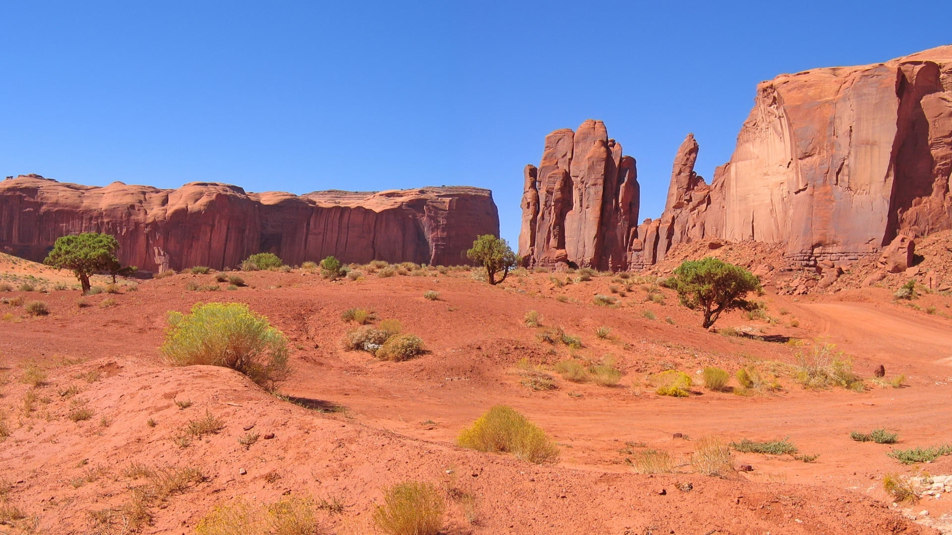 Monument Valley, Rocce rosse, Cespugli, Cielo blu, 1920x1080, wallpaper desktop